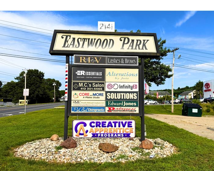 Eastwood Park sign with Creative Apprentice Programs